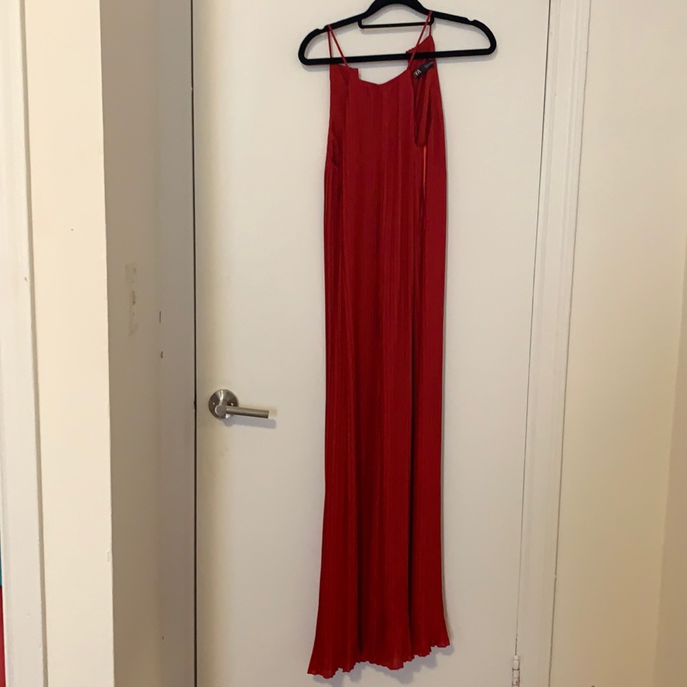 Red pleated jumpsuit